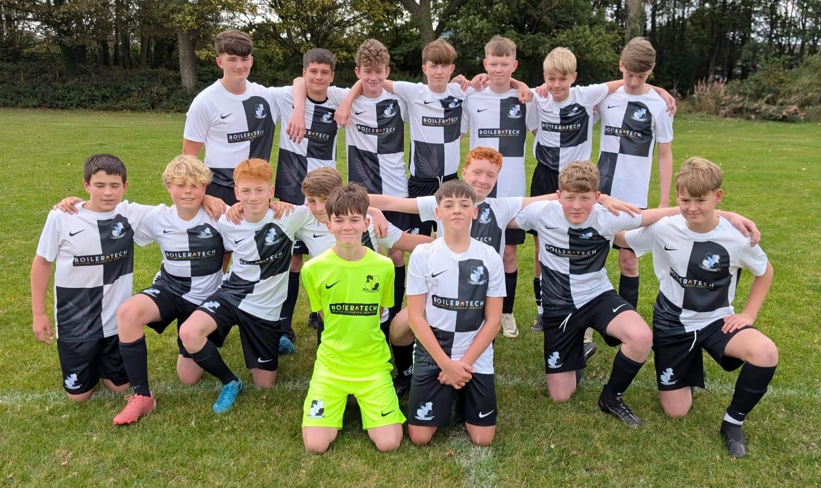 Local youth football team wearing kits sponsored by Boilertech