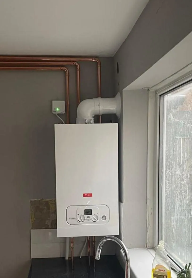 New combi boiler installation with neat copper pipework in North Shields